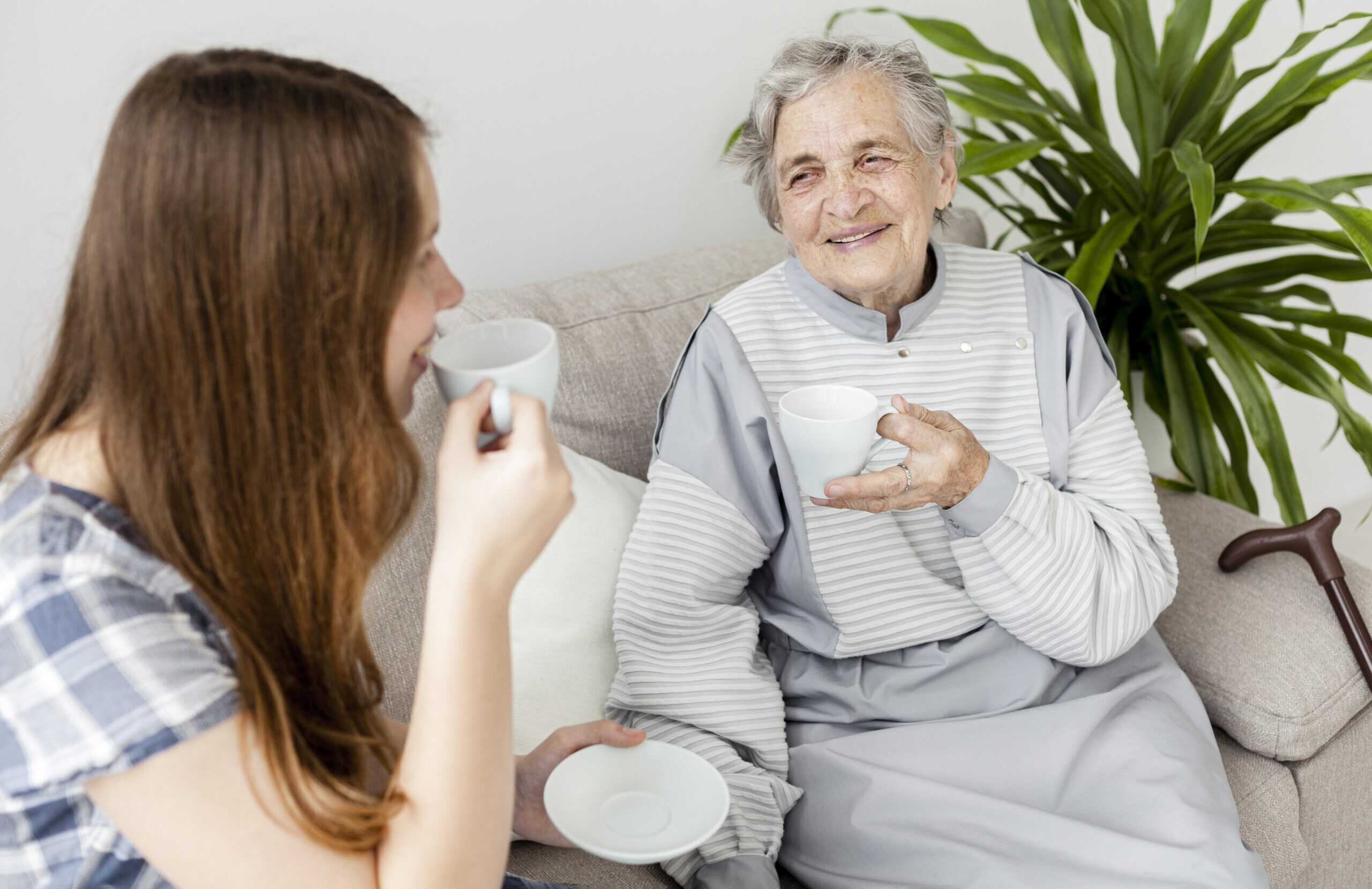 Elderly woman bonding with her granddaughter.