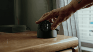 Tranquil Watch charging on the table.