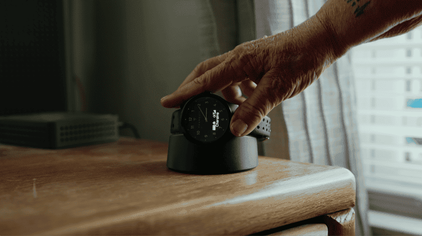 Tranquil Watch charging on the table.